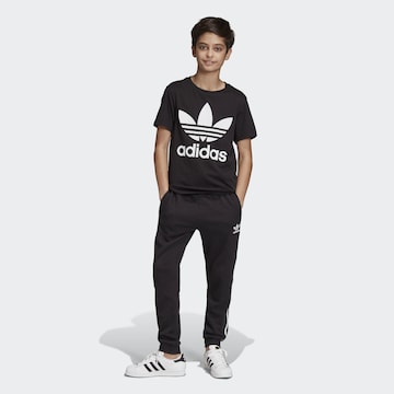 ADIDAS ORIGINALS Paita 'Trefoil' värissä musta