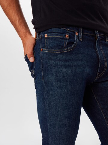 LEVI'S ® - Skinny Calças de ganga 'Skinny Taper' em azul