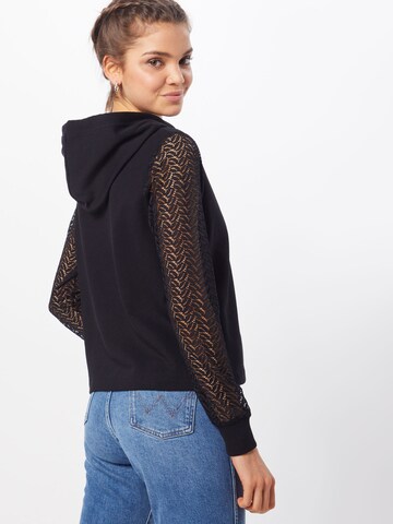 ABOUT YOU Sweatshirt 'Svenja' in Black