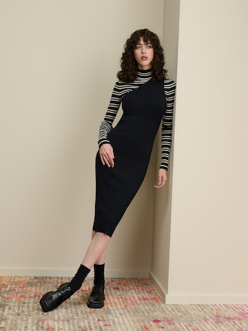 Black Dress With Striped Shirt Look