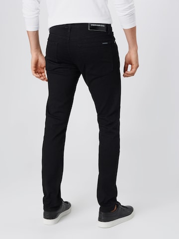 Calvin Klein Jeans Slimfit Farkut 'CKJ 026 SLIM' värissä musta