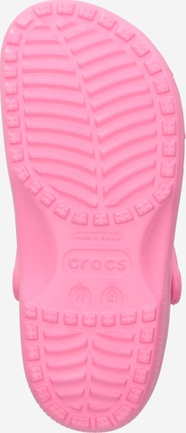 Saboţi 'Classic' de la Crocs pe roz: jos