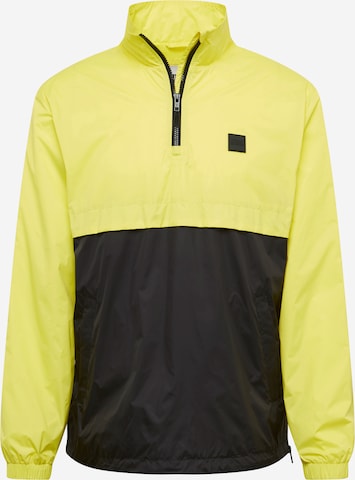 Coupe regular Veste mi-saison Urban Classics en jaune : devant