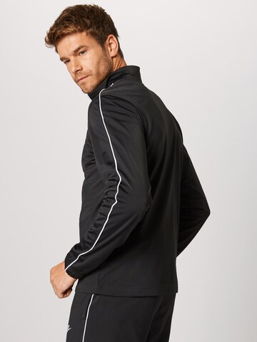 Tuta da jogging di Nike Sportswear in nero: dietro