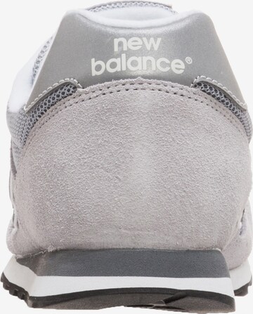 Baskets basses new balance en gris