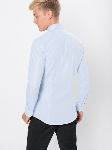 Coupe slim Chemise business OLYMP en bleu : derrière