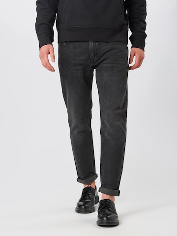 LEVI'S ® Tapered Jeans '502™ Taper Hi Ball' in Zwart: voorkant