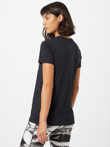 UNDER ARMOUR - Camiseta funcional en negro
