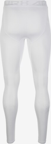 Skinny Pantalon de sport 'Vanish' UNDER ARMOUR en blanc