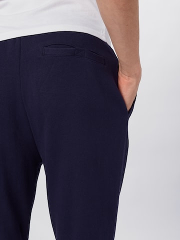 ELLESSE Tapered Trousers 'Nioro' in Blue