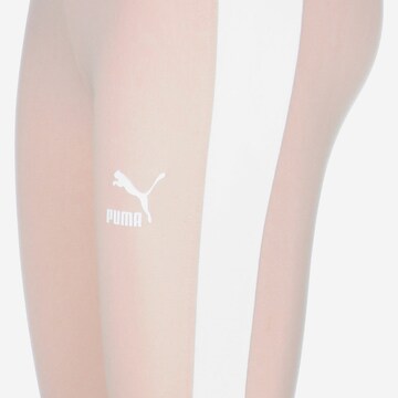 PUMA Skinny Leggings 'Classics Logo T7' in Pink: predná strana