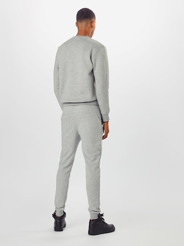 Effilé Pantalon ALPHA INDUSTRIES en gris