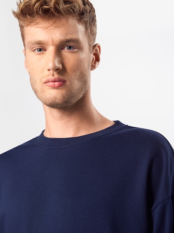 Sweat-shirt Urban Classics en bleu