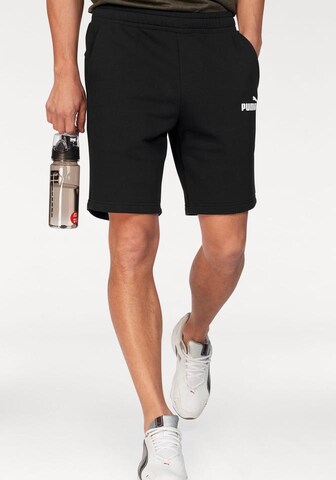 Regular Pantaloni sport de la PUMA pe negru: față