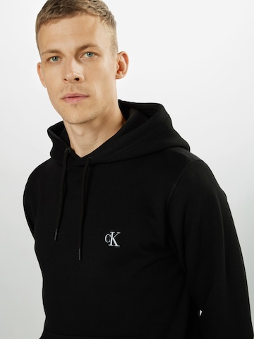 Coupe regular Sweat-shirt Calvin Klein Jeans en noir