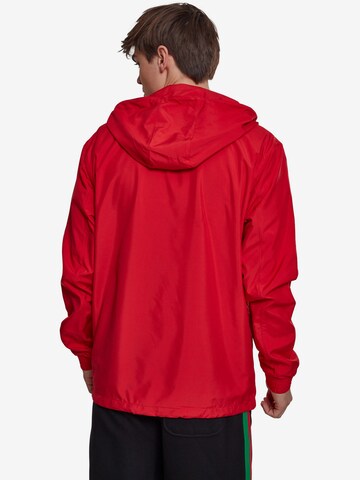 Veste mi-saison Urban Classics en rouge