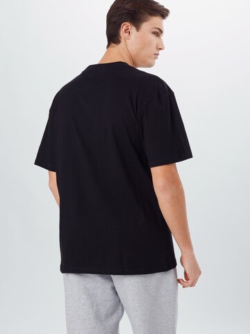 Coupe regular T-Shirt 'Signature' Karl Kani en noir