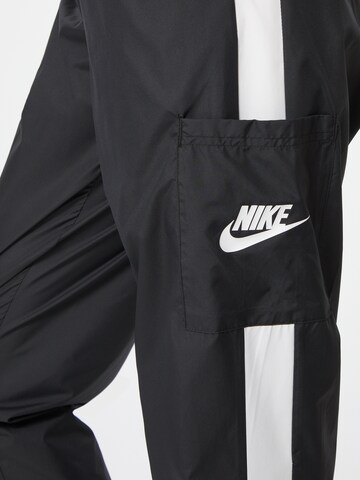Nike Sportswear Tapered Trousers in Black