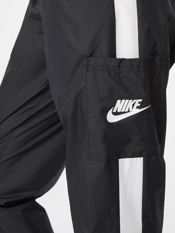 Nike Sportswear Дънки Tapered Leg Панталон в черно