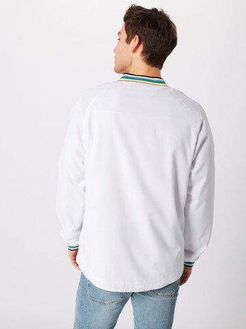 Coupe regular Veste mi-saison Urban Classics en blanc : derrière