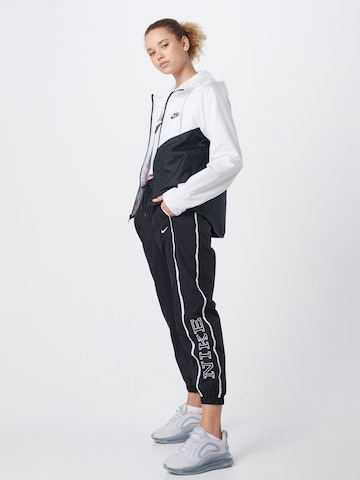 Nike Sportswear Prehodna jakna | črna barva