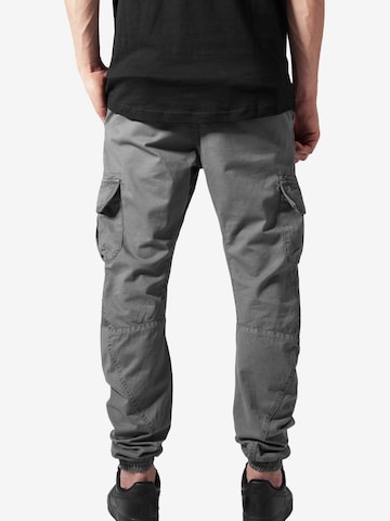 Tapered Pantaloni cargo di Urban Classics in grigio