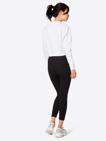 Urban Classics Skinny Leggings 'Eyelet' i svart: baksida