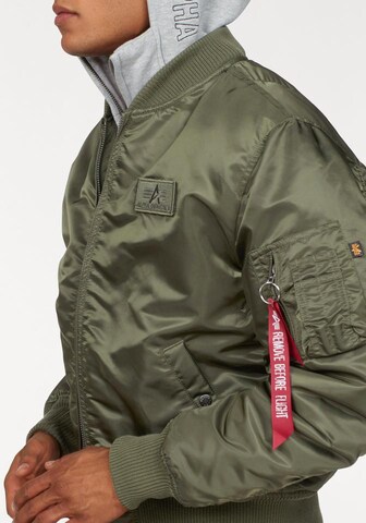 ALPHA INDUSTRIES Between-Season Jacket 'MA-1 D-Tec' in Green