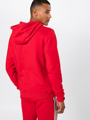 Sweat-shirt Urban Classics en rouge : derrière