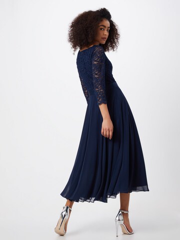 Robe de cocktail SWING en bleu : derrière