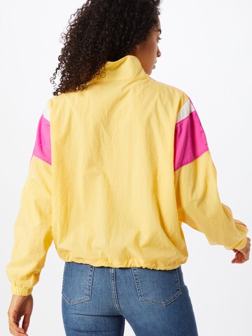 Veste fonctionnelle 'Heritage Half-Zip' Nike Sportswear en jaune