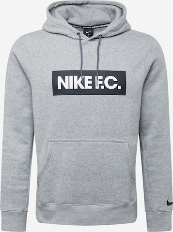 Sweat de sport NIKE en gris : devant