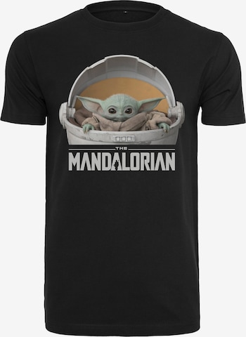 Coupe regular T-Shirt 'Baby Yoda Mandalorian' Mister Tee en noir : devant