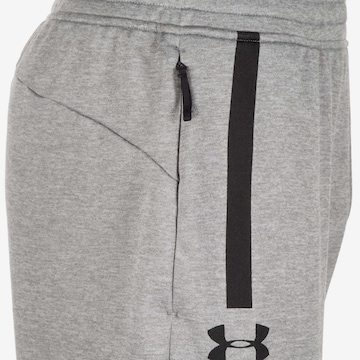 UNDER ARMOUR Slimfit Trainingshose 'MK-1 Terry' in Grau