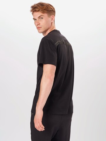 PUMA T-Shirt in Schwarz