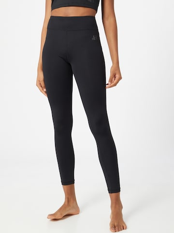 Skinny Pantaloni sportivi di CURARE Yogawear in nero: frontale