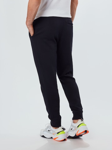 Nike SportswearTapered Hlače 'Club Fleece' - crna boja