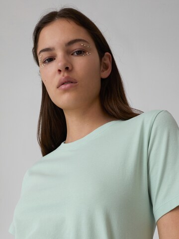 EDITED T-Shirt 'Enid' in Grün