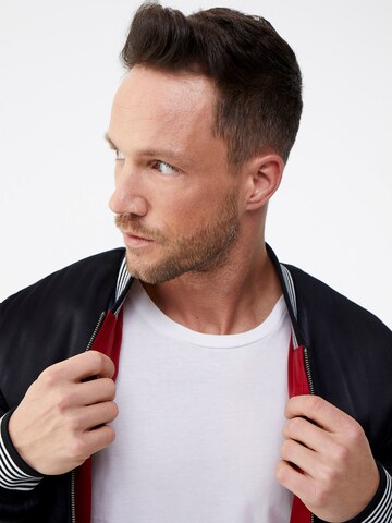 DAN FOX APPAREL Between-Season Jacket 'Jan' in Black