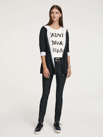 Skinny Jeans de la heine pe negru