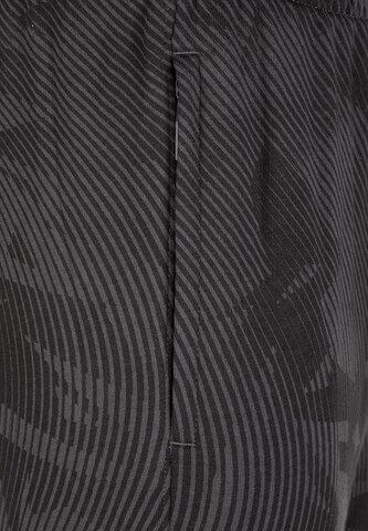 Slimfit Pantaloni sportivi 'Cup Casuals' di PUMA in grigio