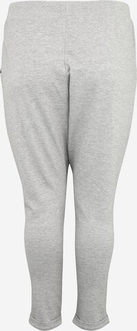 Tapered Pantaloni 'Terry' di Urban Classics in grigio