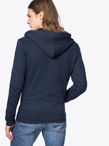 TOMMY HILFIGER - Sudadera con cremallera en azul: atrás