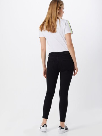 Skinny Jeans di Superdry in nero