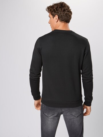 LACOSTE Sweatshirt in Zwart: terug