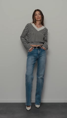 Jeans And Striped Sweater Look