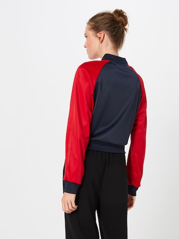 Veste mi-saison Urban Classics en rouge : derrière