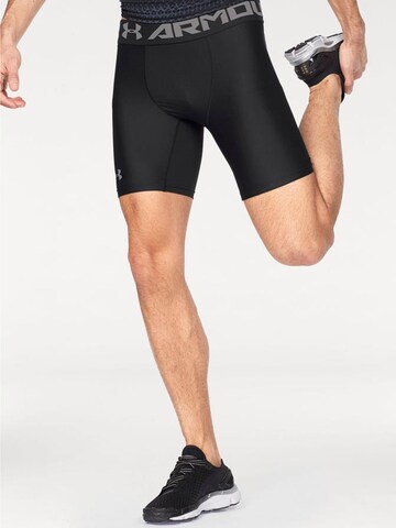 UNDER ARMOUR Skinny Workout Pants in Black: front