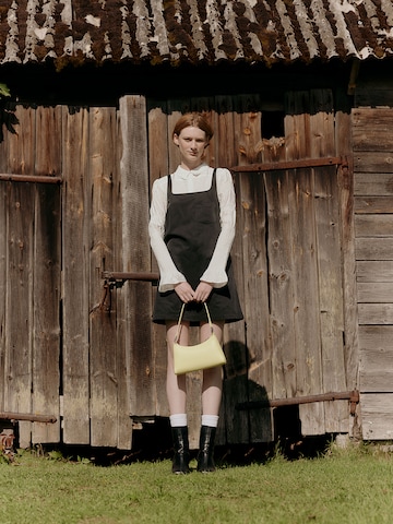 Neat Feminine Pinafore Look