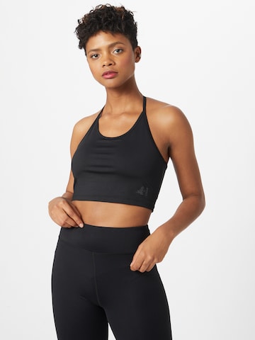 CURARE Yogawear Regular Sportbehå i svart: framsida